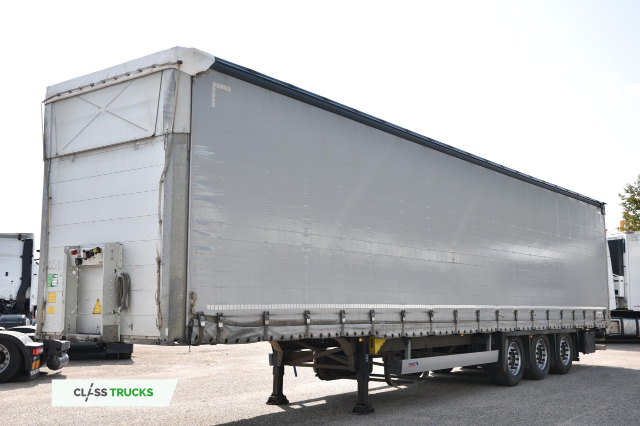 Schmitz Cargobull SCS24/L Varios - Тентованный полуприцеп: фото 1 Schmitz Cargobull SCS24/L Varios - Тентованный полуприцеп: фото 1