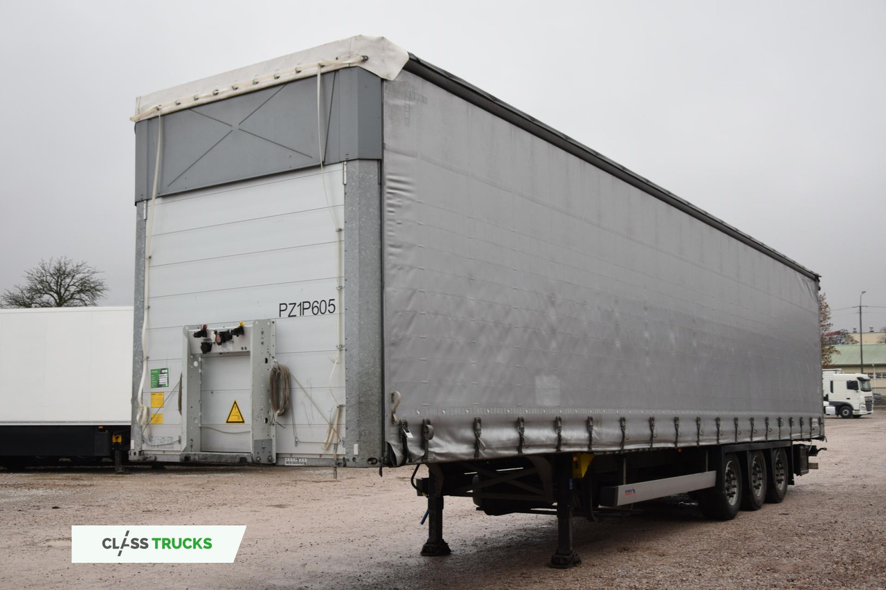 Schmitz Cargobull SCS24/L Varios - Тентованный полуприцеп: фото 1 Schmitz Cargobull SCS24/L Varios - Тентованный полуприцеп: фото 1