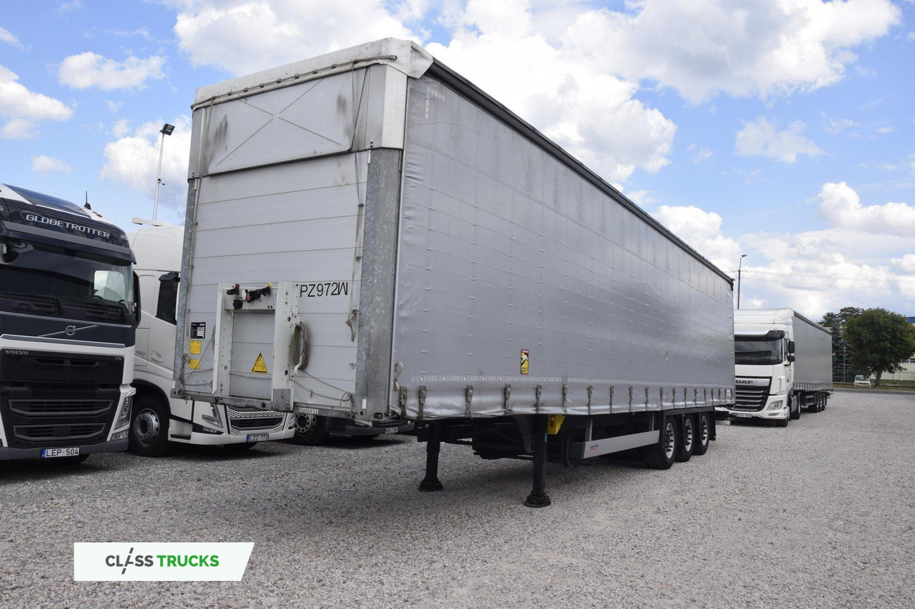 Schmitz Cargobull SCS24/L Varios - Тентованный полуприцеп: фото 1 Schmitz Cargobull SCS24/L Varios - Тентованный полуприцеп: фото 1