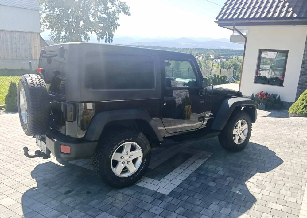 Кабриолет Jeep Wrangler 2.8 CRD Sport: фото 10 Кабриолет Jeep Wrangler 2.8 CRD Sport: фото 10