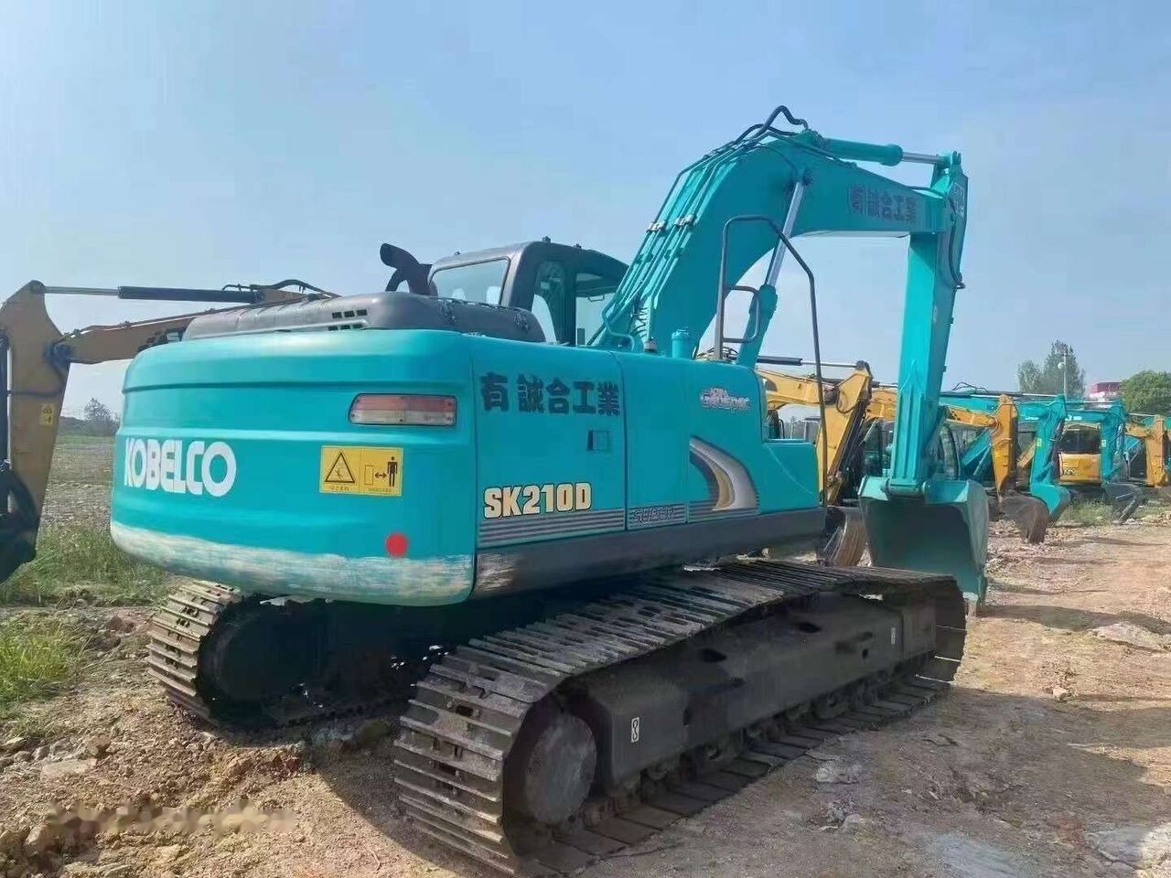 Kobelco SK210D - Гусеничный экскаватор: фото 2 Kobelco SK210D - Гусеничный экскаватор: фото 2