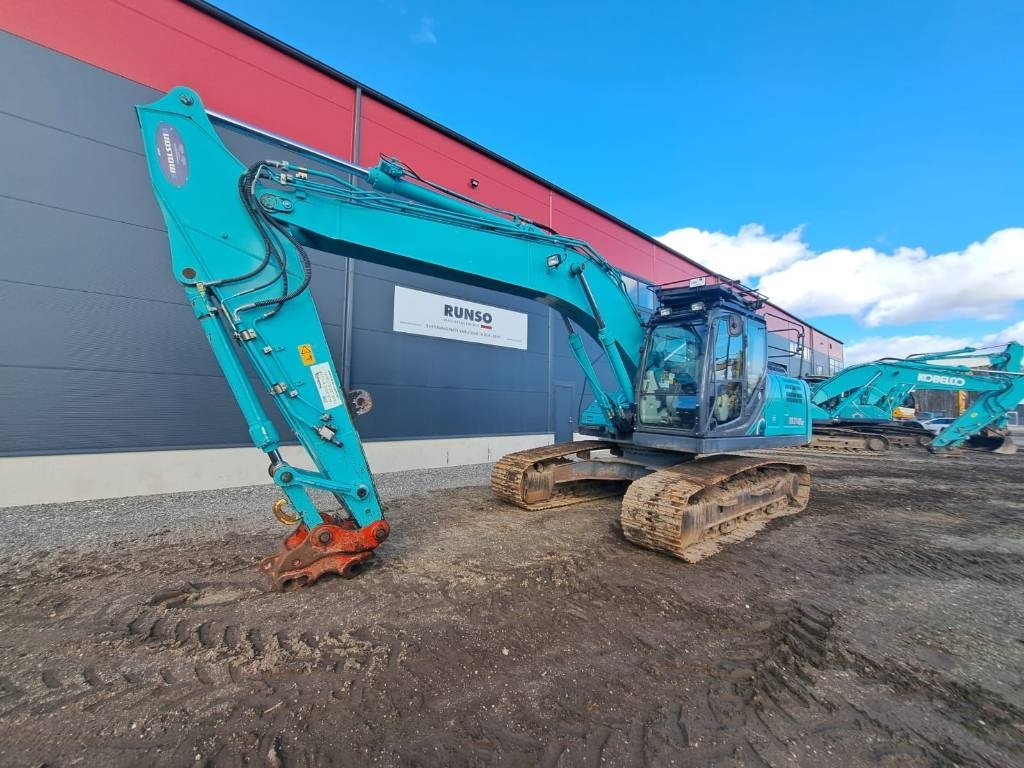 Kobelco SK 210-10 - Гусеничный экскаватор: фото 1 Kobelco SK 210-10 - Гусеничный экскаватор: фото 1
