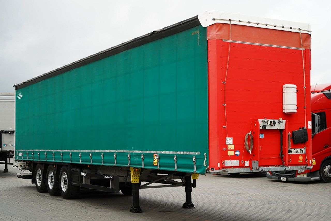 Schmitz Cargobull FIRANKA / STANDARD / DWIE OSIE PODNOSZONE / WI - Тентованный полуприцеп: фото 4 Schmitz Cargobull FIRANKA / STANDARD / DWIE OSIE PODNOSZONE / WI - Тентованный полуприцеп: фото 4