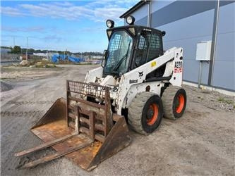 Bobcat A 220 - Мини-погрузчик с бортовым поворотом: фото 1 Bobcat A 220 - Мини-погрузчик с бортовым поворотом: фото 1