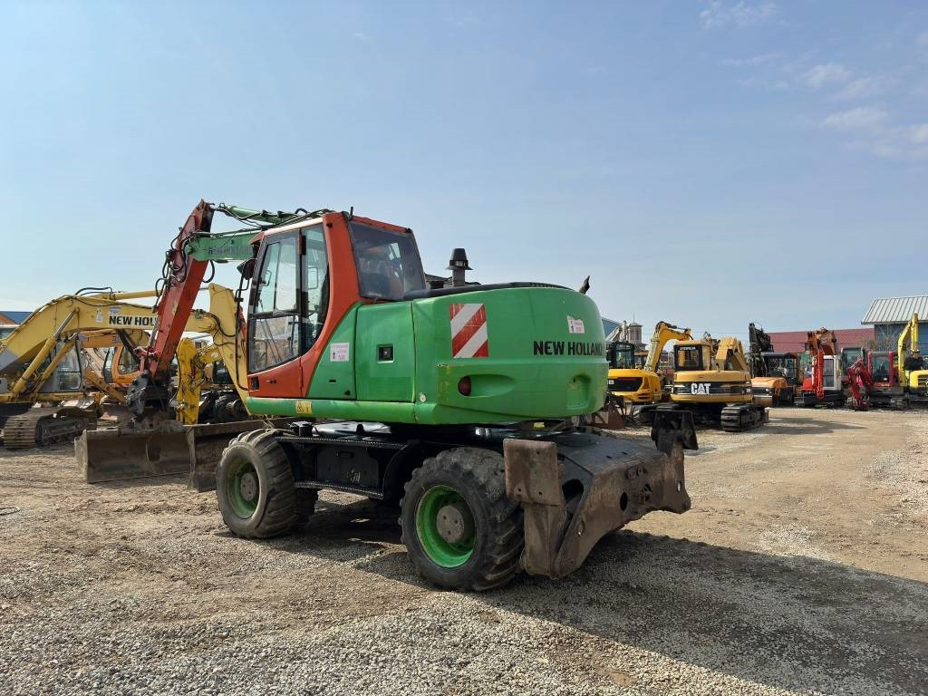 New Holland MH Plus  - Колёсный экскаватор: фото 5 New Holland MH Plus  - Колёсный экскаватор: фото 5