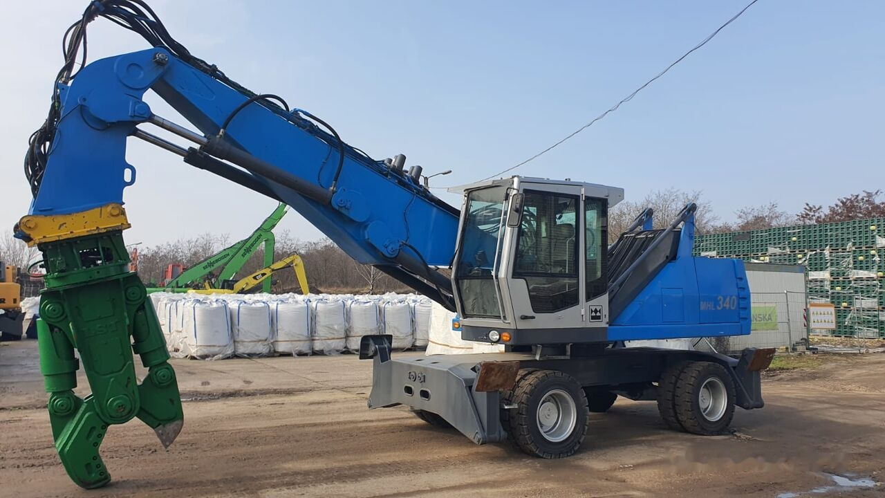 Fuchs MHL 340D FQC + LST 3to shear - Перегружатель: фото 2 Fuchs MHL 340D FQC + LST 3to shear - Перегружатель: фото 2