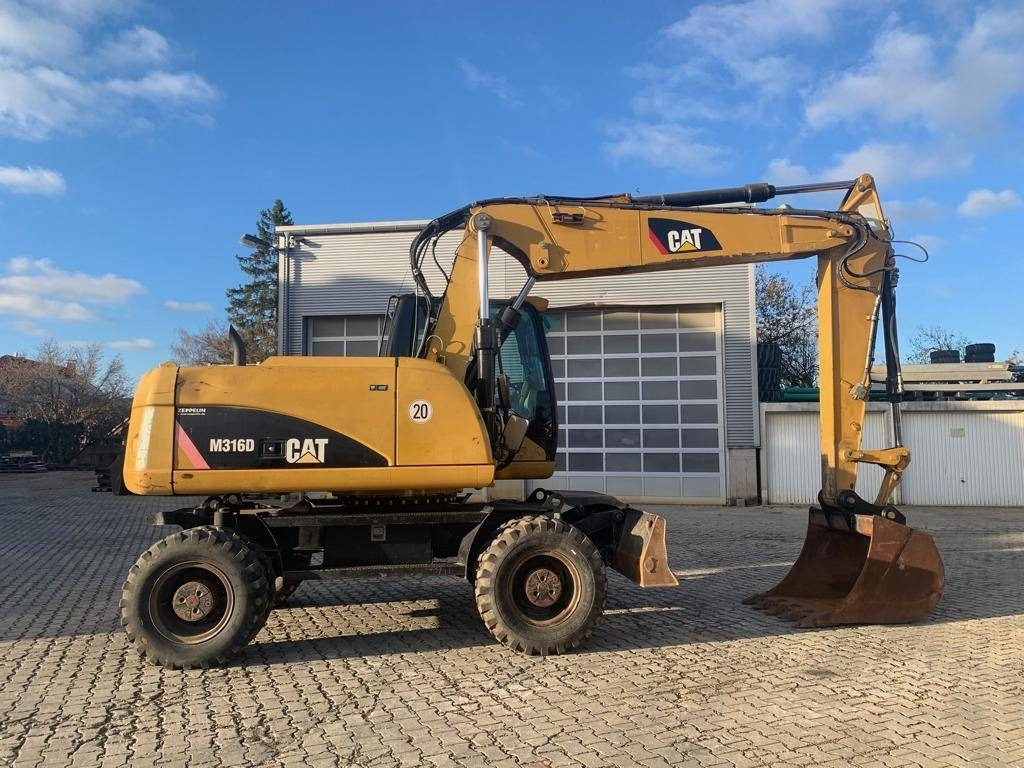 Колёсный экскаватор CAT M 316 D: фото 6