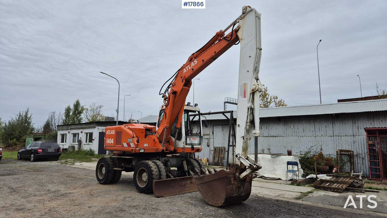 1995 Atlas 1404 - Колёсный экскаватор: фото 1 1995 Atlas 1404 - Колёсный экскаватор: фото 1