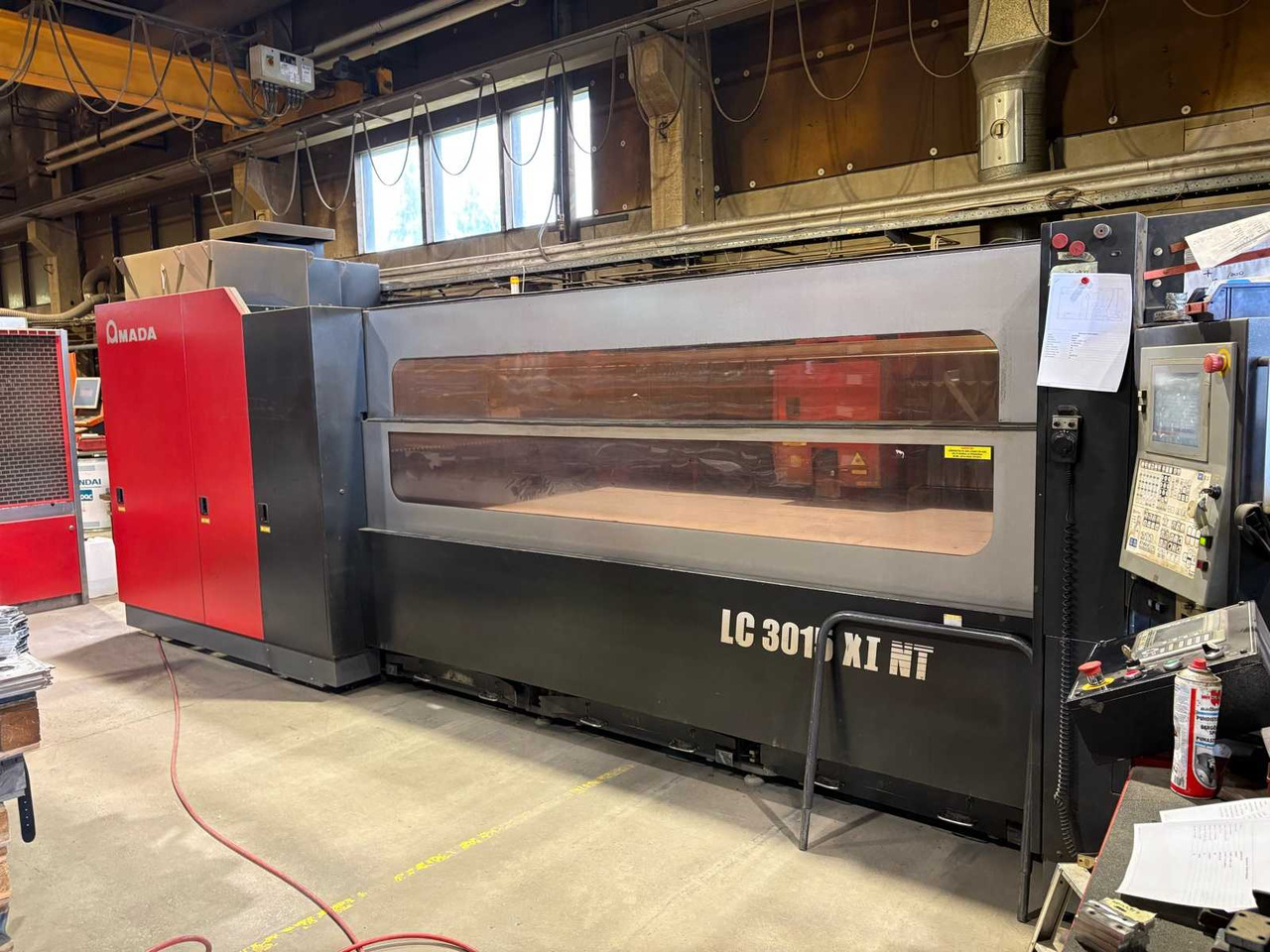 CNC Controlled CO2 Laser Cutting Machine Amada LC 3015 X1 NT - Металлообрабатывающий станок: фото 1 CNC Controlled CO2 Laser Cutting Machine Amada LC 3015 X1 NT - Металлообрабатывающий станок: фото 1