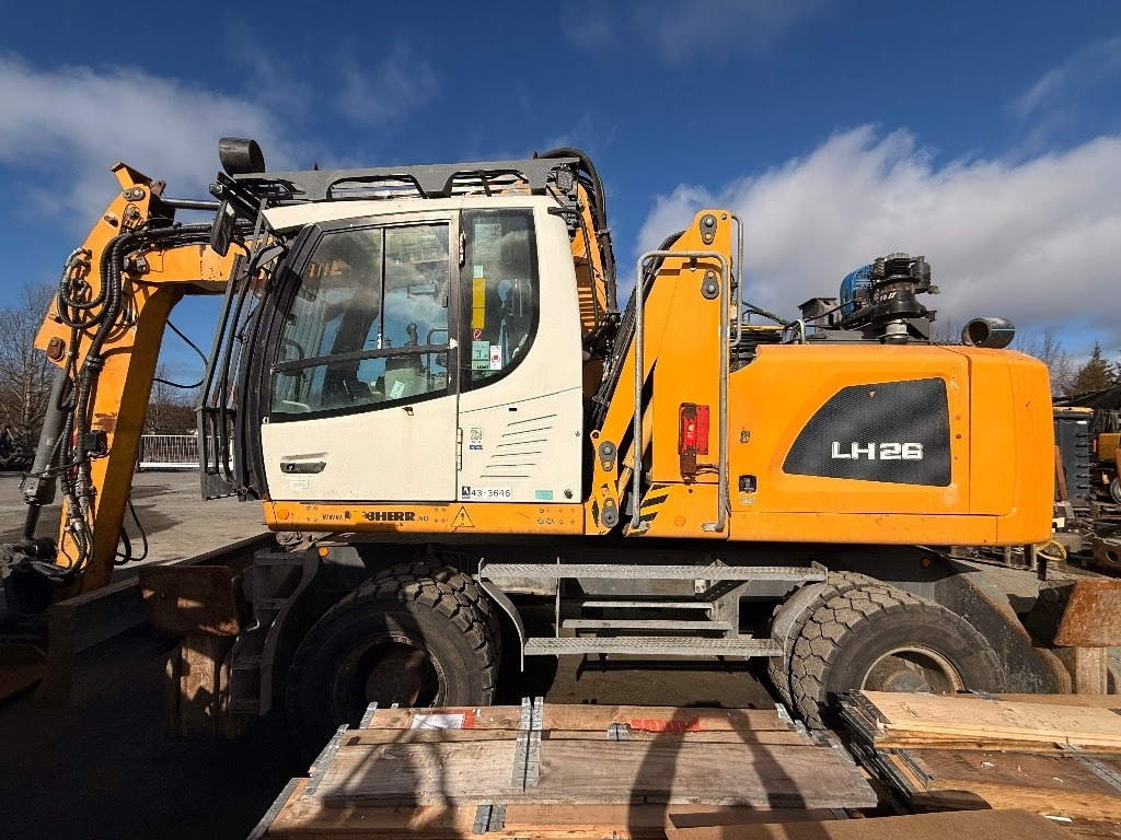 Колёсный экскаватор Liebherr LH 26 M Litronic: фото 1