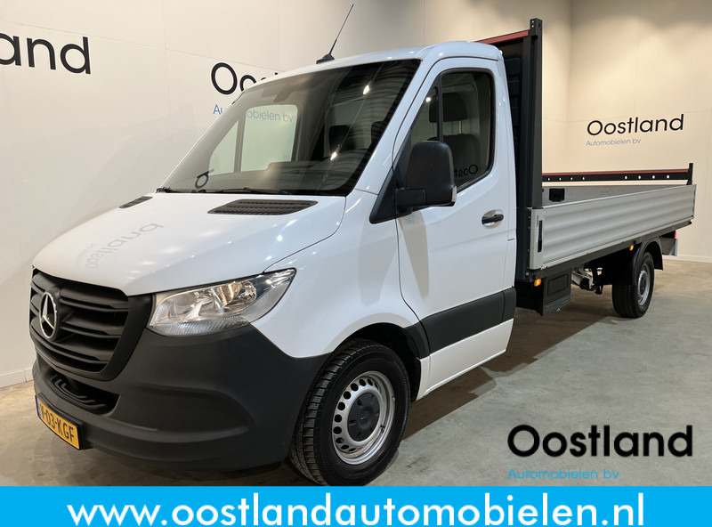 Mercedes-Benz Sprinter 315 CDI L3 RWD Open Laadbak / Euro 6 / Airco / MBUX / CarPlay / Navigatie / 3-Zits / 75.200 KM !! / BPM VRIJ !! - Малотоннажный бортовой грузовик: фото 1 Mercedes-Benz Sprinter 315 CDI L3 RWD Open Laadbak / Euro 6 / Airco / MBUX / CarPlay / Navigatie / 3-Zits / 75.200 KM !! / BPM VRIJ !! - Малотоннажный бортовой грузовик: фото 1