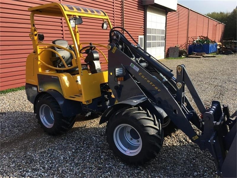 Eurotrac W12 m. lang arm - Компактный фронтальный погрузчик: фото 4 Eurotrac W12 m. lang arm - Компактный фронтальный погрузчик: фото 4