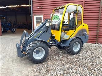 Eurotrac W12 med førerhus - Компактный фронтальный погрузчик: фото 1 Eurotrac W12 med førerhus - Компактный фронтальный погрузчик: фото 1