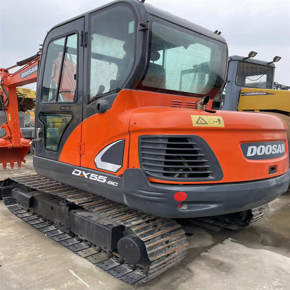 Original Color Used Doosan Dx55 Mini Excavator Used 5 Ton 5.5ton Mini Doosan Excavator for Sale Used Doosan Dx55-9c - Мини-экскаватор: фото 1 Original Color Used Doosan Dx55 Mini Excavator Used 5 Ton 5.5ton Mini Doosan Excavator for Sale Used Doosan Dx55-9c - Мини-экскаватор: фото 1