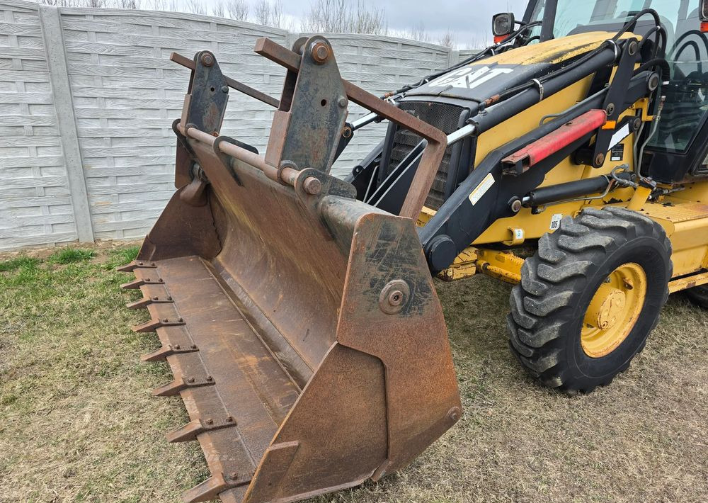 Caterpillar - Экскаватор-погрузчик: фото 4 Caterpillar - Экскаватор-погрузчик: фото 4