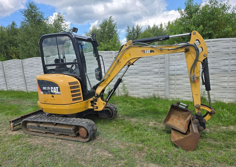 Caterpillar - Мини-экскаватор: фото 1 Caterpillar - Мини-экскаватор: фото 1
