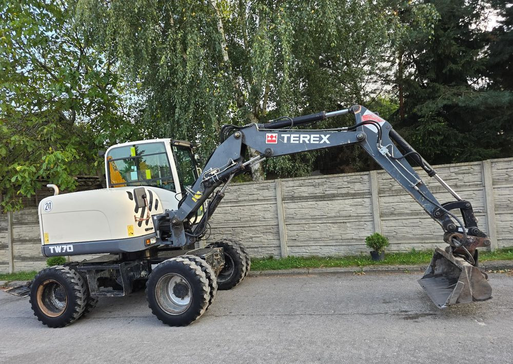 Колёсный экскаватор Terex: фото 8