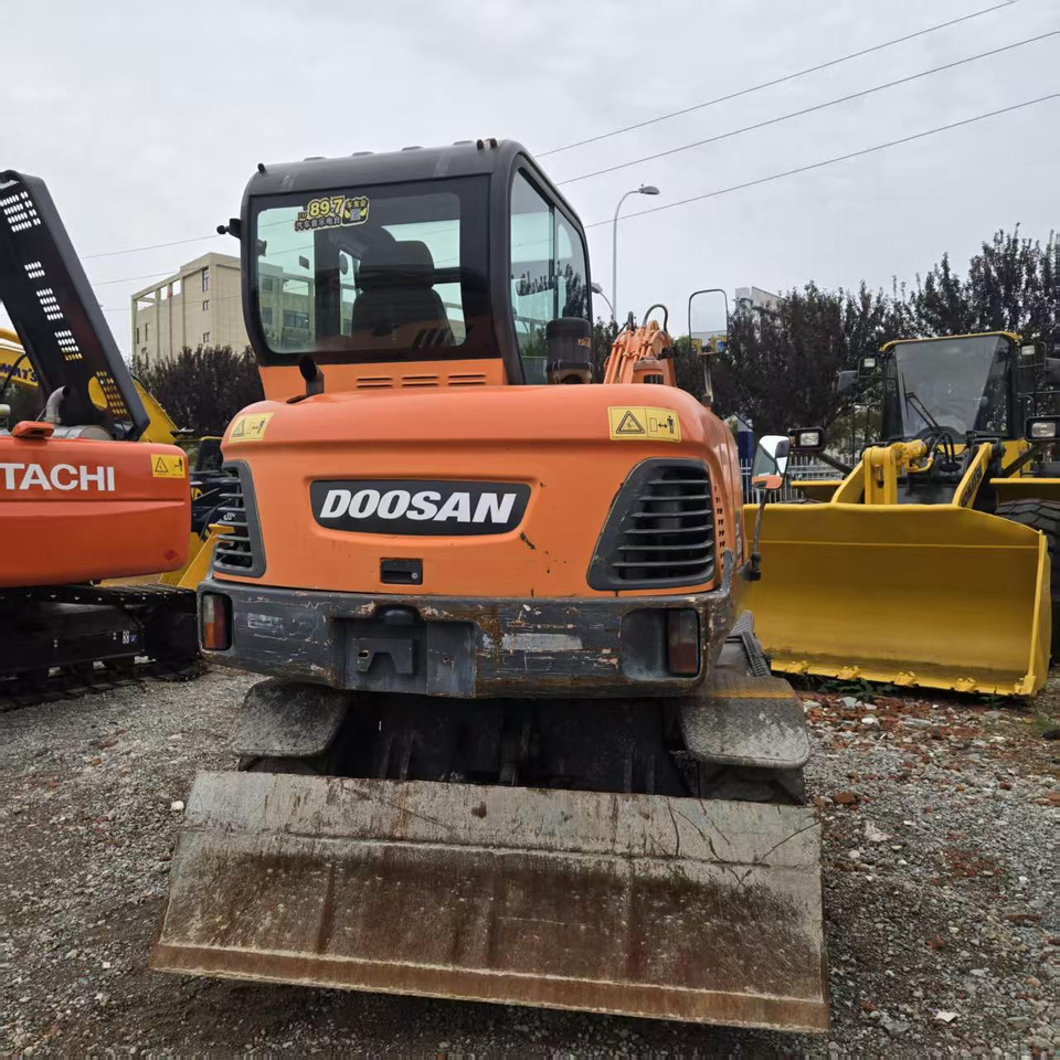 DOOSAN DX60W - Колёсный экскаватор: фото 4 DOOSAN DX60W - Колёсный экскаватор: фото 4