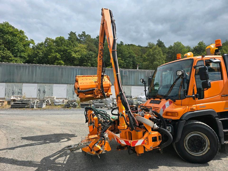 Mulag MKM 700 Mähausleger 2015 Böschungsmäher Böschungsmulcher Tandemmäher Für Unimog UGE UGN 405 427 424 U400 300 500 - Манипуляторная косилка: фото 4 Mulag MKM 700 Mähausleger 2015 Böschungsmäher Böschungsmulcher Tandemmäher Für Unimog UGE UGN 405 427 424 U400 300 500 - Манипуляторная косилка: фото 4