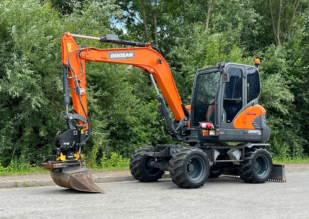 Doosan DOOSAN DX57W *ROTOTILT* 2200 Motogodzin JAK NOWA KOPARKA KOŁOWA STAN PERFEKCYJNY SPROWADZONA - Колёсный экскаватор: фото 1 Doosan DOOSAN DX57W *ROTOTILT* 2200 Motogodzin JAK NOWA KOPARKA KOŁOWA STAN PERFEKCYJNY SPROWADZONA - Колёсный экскаватор: фото 1