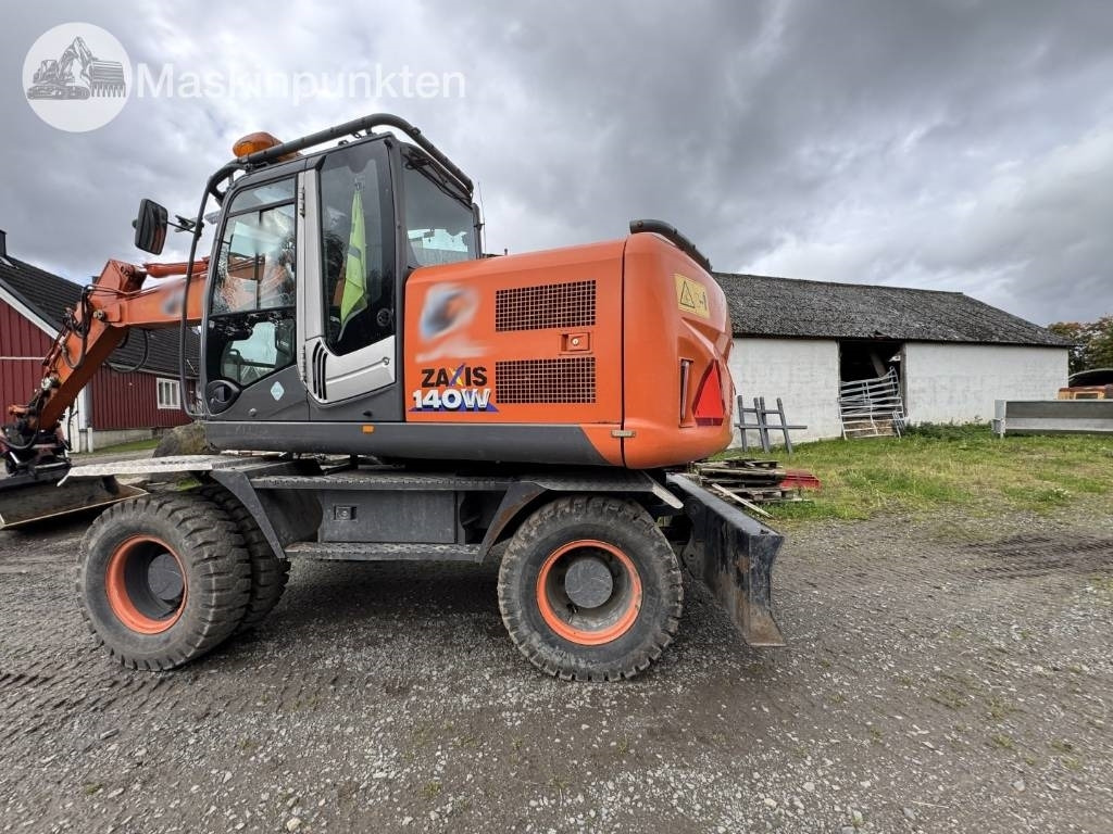 Hitachi ZX 140 W-3 - Колёсный экскаватор: фото 2 Hitachi ZX 140 W-3 - Колёсный экскаватор: фото 2