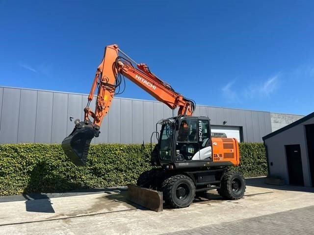 Hitachi 140W-5B - Колёсный экскаватор: фото 1 Hitachi 140W-5B - Колёсный экскаватор: фото 1