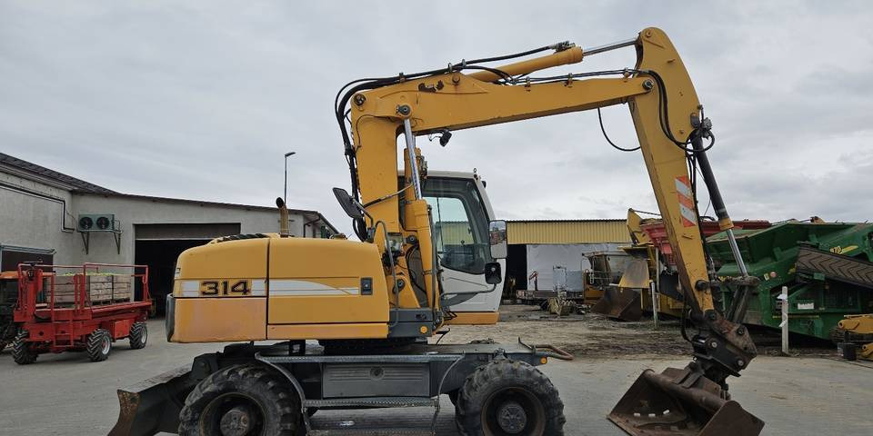 Koparka kołowa Liebherr A314 Litronic 9350 h+ 5 łyżek kołówka - Колёсный экскаватор: фото 5 Koparka kołowa Liebherr A314 Litronic 9350 h+ 5 łyżek kołówka - Колёсный экскаватор: фото 5