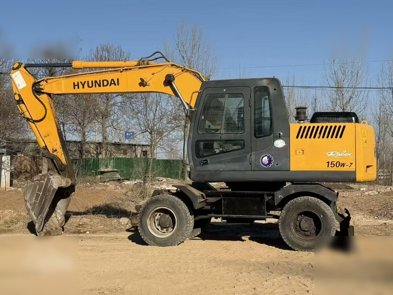 HYUNDAI ROBEX 150W-7A - Колёсный экскаватор: фото 1 HYUNDAI ROBEX 150W-7A - Колёсный экскаватор: фото 1
