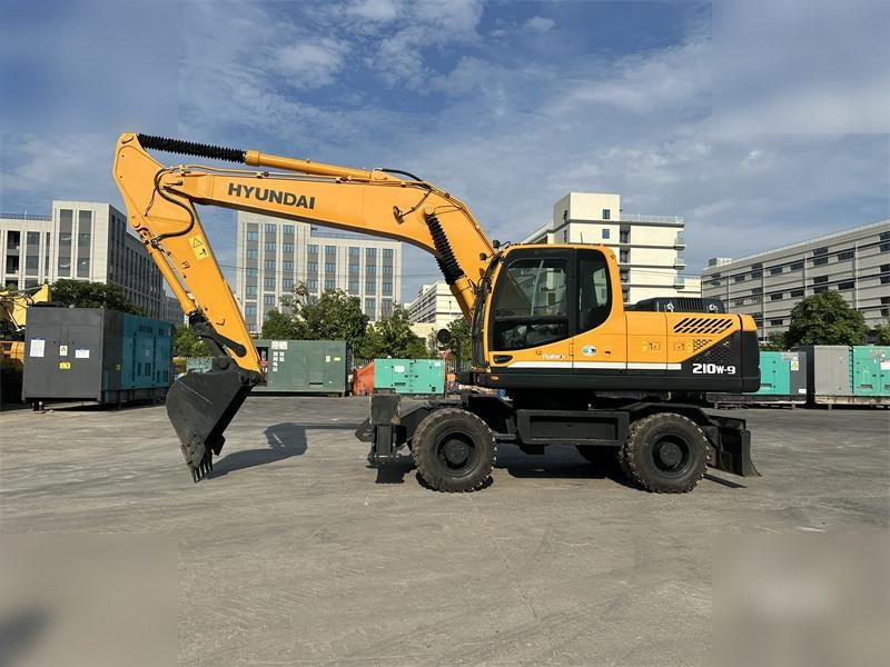 HYUNDAI ROBEX 210W-9 - Колёсный экскаватор: фото 1 HYUNDAI ROBEX 210W-9 - Колёсный экскаватор: фото 1