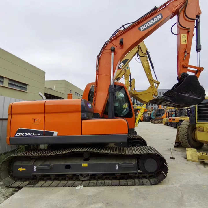 Used Digger DOOSAN DX140 Construction Machinery Construction Digger Used DOOSAN DX140 Cheap Excavator - Гусеничный экскаватор: фото 1 Used Digger DOOSAN DX140 Construction Machinery Construction Digger Used DOOSAN DX140 Cheap Excavator - Гусеничный экскаватор: фото 1