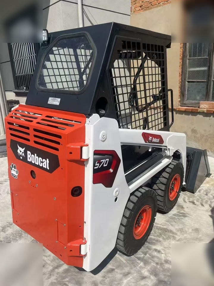 BOBCAT S70 - Мини-погрузчик с бортовым поворотом: фото 1 BOBCAT S70 - Мини-погрузчик с бортовым поворотом: фото 1