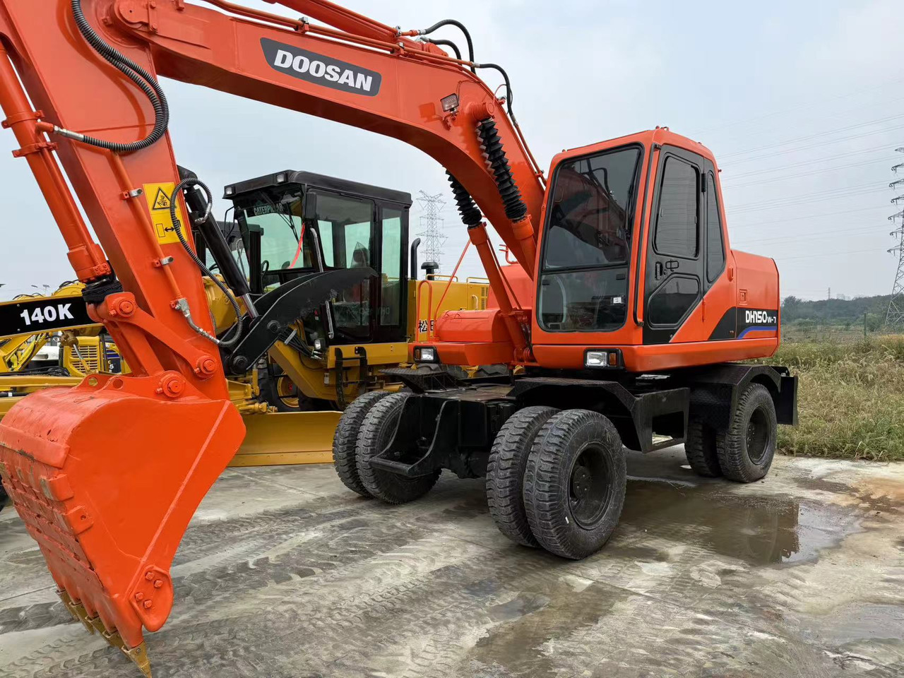 DOOSAN Good Condition Original Doosan DH150w-7 Wheel Excavator 15 Tons Used Doosan Dh150w-7 Excavator Used Wheel Excavator for Sale - Колёсный экскаватор: фото 1 DOOSAN Good Condition Original Doosan DH150w-7 Wheel Excavator 15 Tons Used Doosan Dh150w-7 Excavator Used Wheel Excavator for Sale - Колёсный экскаватор: фото 1