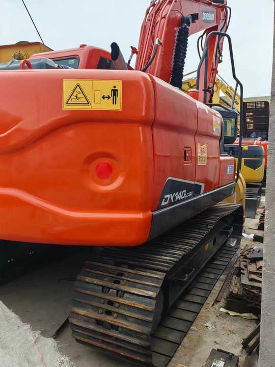 Used Doosan Hydraulic Excavator DX140 Low Price Korea Doosan DX140-9 Used Excavator for Sale - Гусеничный экскаватор: фото 5 Used Doosan Hydraulic Excavator DX140 Low Price Korea Doosan DX140-9 Used Excavator for Sale - Гусеничный экскаватор: фото 5