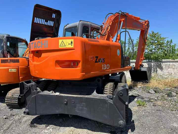 Used Wheel Excavator Hitachi ZX 130W Made in Japan 13ton Hitachi Zx130w Wheel Excavator Price Used Hitachi Zx130 Excavator SALE - Экскаватор: фото 2 Used Wheel Excavator Hitachi ZX 130W Made in Japan 13ton Hitachi Zx130w Wheel Excavator Price Used Hitachi Zx130 Excavator SALE - Экскаватор: фото 2