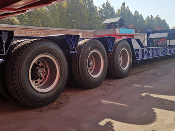 TITAN 120 Ton Lowboy Truck Trailer for Sale in Zambia - Низкорамный полуприцеп: фото 4 TITAN 120 Ton Lowboy Truck Trailer for Sale in Zambia - Низкорамный полуприцеп: фото 4