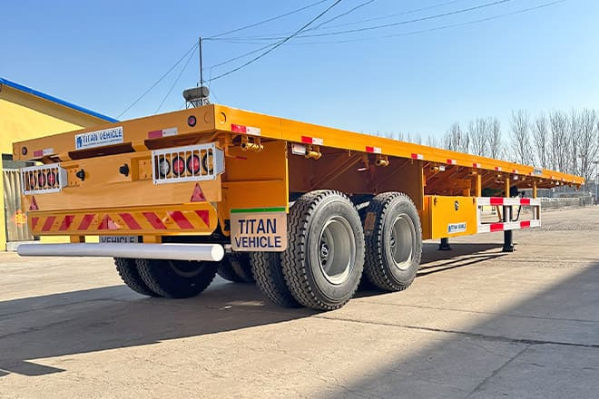 TITAN 2 Axle 40 Ft Flatbed Trailer for Sale in Uganda - Полуприцеп бортовой/ Платформа: фото 3 TITAN 2 Axle 40 Ft Flatbed Trailer for Sale in Uganda - Полуприцеп бортовой/ Платформа: фото 3
