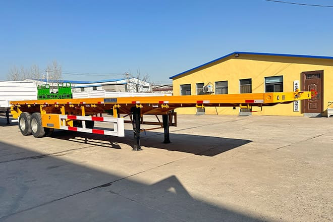 TITAN 2 Axle 40 Ft Flatbed Trailer for Sale in Uganda - Полуприцеп бортовой/ Платформа: фото 2 TITAN 2 Axle 40 Ft Flatbed Trailer for Sale in Uganda - Полуприцеп бортовой/ Платформа: фото 2