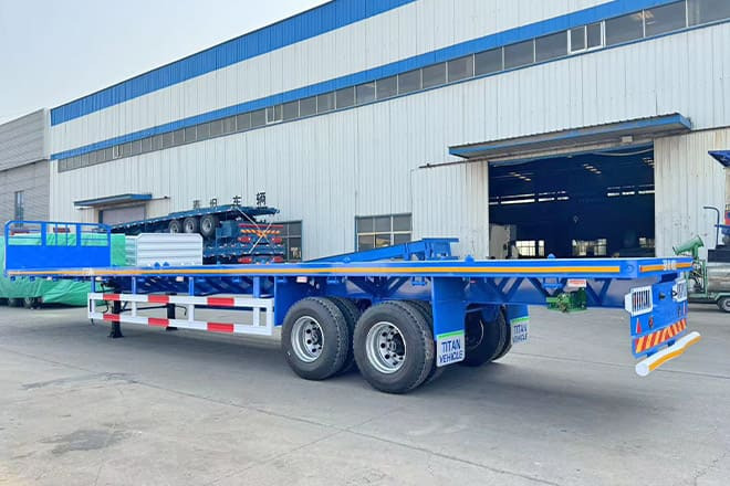 TITAN 2 Axle 45 Ft Flatbed Trailers for Sale in Algeria - Полуприцеп бортовой/ Платформа: фото 1 TITAN 2 Axle 45 Ft Flatbed Trailers for Sale in Algeria - Полуприцеп бортовой/ Платформа: фото 1