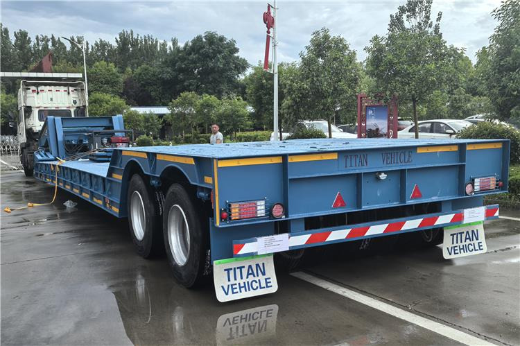 TITAN 2 Axle 80 Ton Detachable Gooseneck Trailer for Sale In Nigeria - Низкорамный полуприцеп: фото 2 TITAN 2 Axle 80 Ton Detachable Gooseneck Trailer for Sale In Nigeria - Низкорамный полуприцеп: фото 2