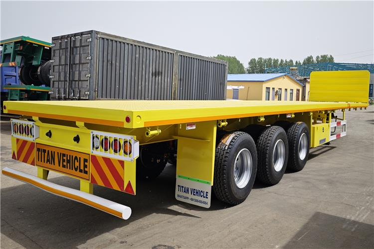 TITAN 2025 New Model Tri Axle Trailer for Sale In Jamaica - Полуприцеп-контейнеровоз/ Сменный кузов: фото 4 TITAN 2025 New Model Tri Axle Trailer for Sale In Jamaica - Полуприцеп-контейнеровоз/ Сменный кузов: фото 4