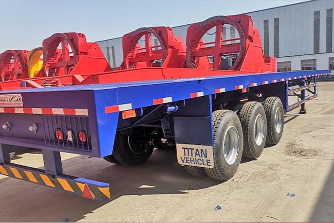 TITAN 3 Axle Extendable Flatbed Trailers for Sale in Angola - Полуприцеп бортовой/ Платформа: фото 5 TITAN 3 Axle Extendable Flatbed Trailers for Sale in Angola - Полуприцеп бортовой/ Платформа: фото 5