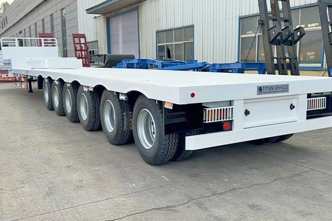TITAN 6 Axle Step Deck Flatbed Trailer for Sale in Philippines - Полуприцеп бортовой/ Платформа: фото 2 TITAN 6 Axle Step Deck Flatbed Trailer for Sale in Philippines - Полуприцеп бортовой/ Платформа: фото 2