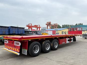 TITAN Flatbed Tri Axle Truck Trailer for Sale in Tanzania - Полуприцеп бортовой/ Платформа: фото 3 TITAN Flatbed Tri Axle Truck Trailer for Sale in Tanzania - Полуприцеп бортовой/ Платформа: фото 3