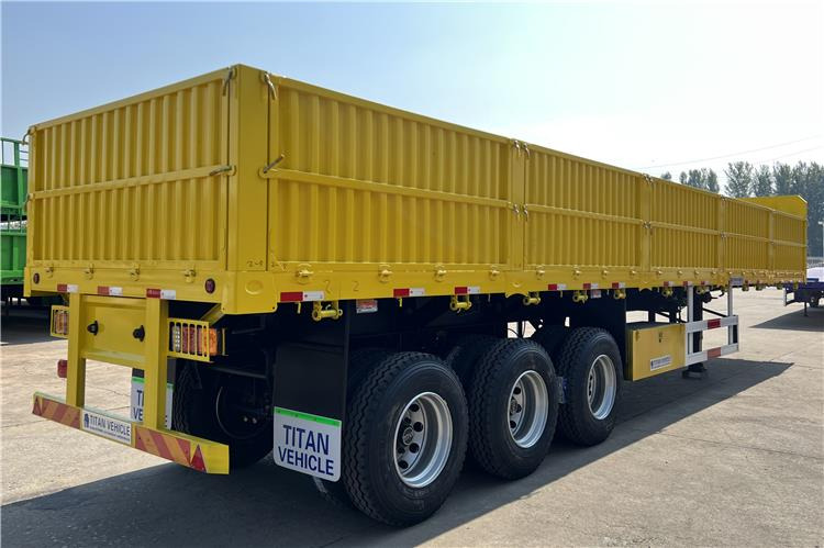 TITAN Triple Axle Trailer with Drop Side Trailer for Sale In Ghana - Полуприцеп бортовой/ Платформа: фото 3 TITAN Triple Axle Trailer with Drop Side Trailer for Sale In Ghana - Полуприцеп бортовой/ Платформа: фото 3