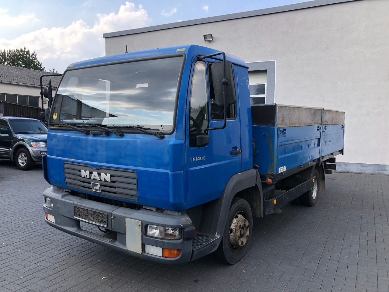 MAN LE 140 C Klima, Tempomat, TÜV 11-2025 - Малотоннажный бортовой грузовик: фото 1 MAN LE 140 C Klima, Tempomat, TÜV 11-2025 - Малотоннажный бортовой грузовик: фото 1