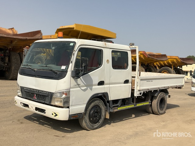 2012 Mitsubishi Canter 4x2 Crew Cab Flatbed Truck - Грузовик бортовой/ Платформа: фото 1 2012 Mitsubishi Canter 4x2 Crew Cab Flatbed Truck - Грузовик бортовой/ Платформа: фото 1