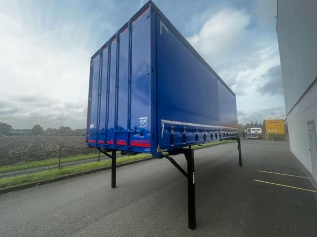 Krone Heck mit Portaltüren - Тентованный кузов: фото 1 Krone Heck mit Portaltüren - Тентованный кузов: фото 1