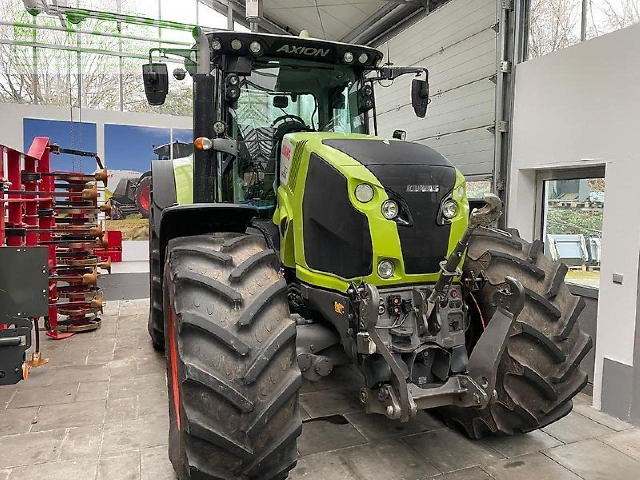 CLAAS axion 870 c-matic CMATIC - Трактор: фото 1 CLAAS axion 870 c-matic CMATIC - Трактор: фото 1