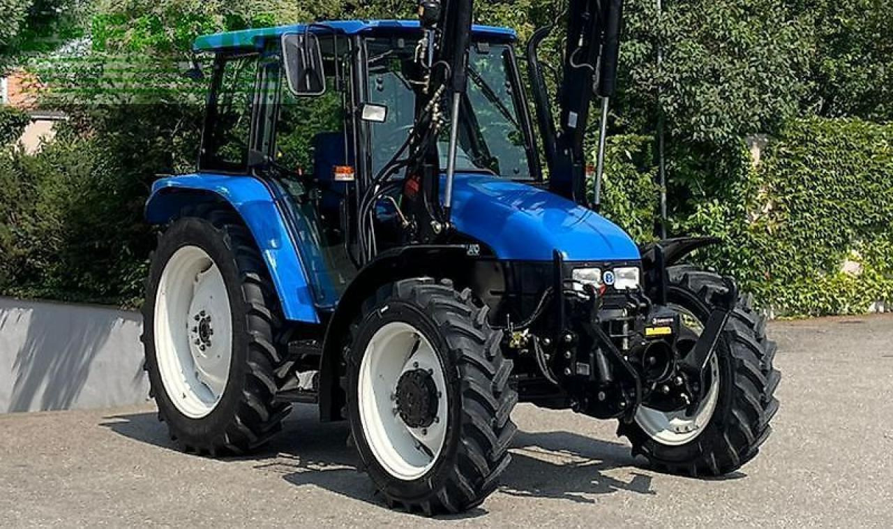 New Holland tl100 (4wd) - Трактор: фото 3 New Holland tl100 (4wd) - Трактор: фото 3
