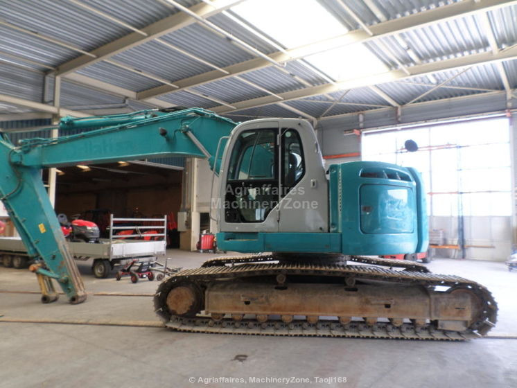 New Holland Kobelco Kobelco E 235 BSR-2 E 235 BSR-2 - Гусеничный экскаватор: фото 1 New Holland Kobelco Kobelco E 235 BSR-2 E 235 BSR-2 - Гусеничный экскаватор: фото 1